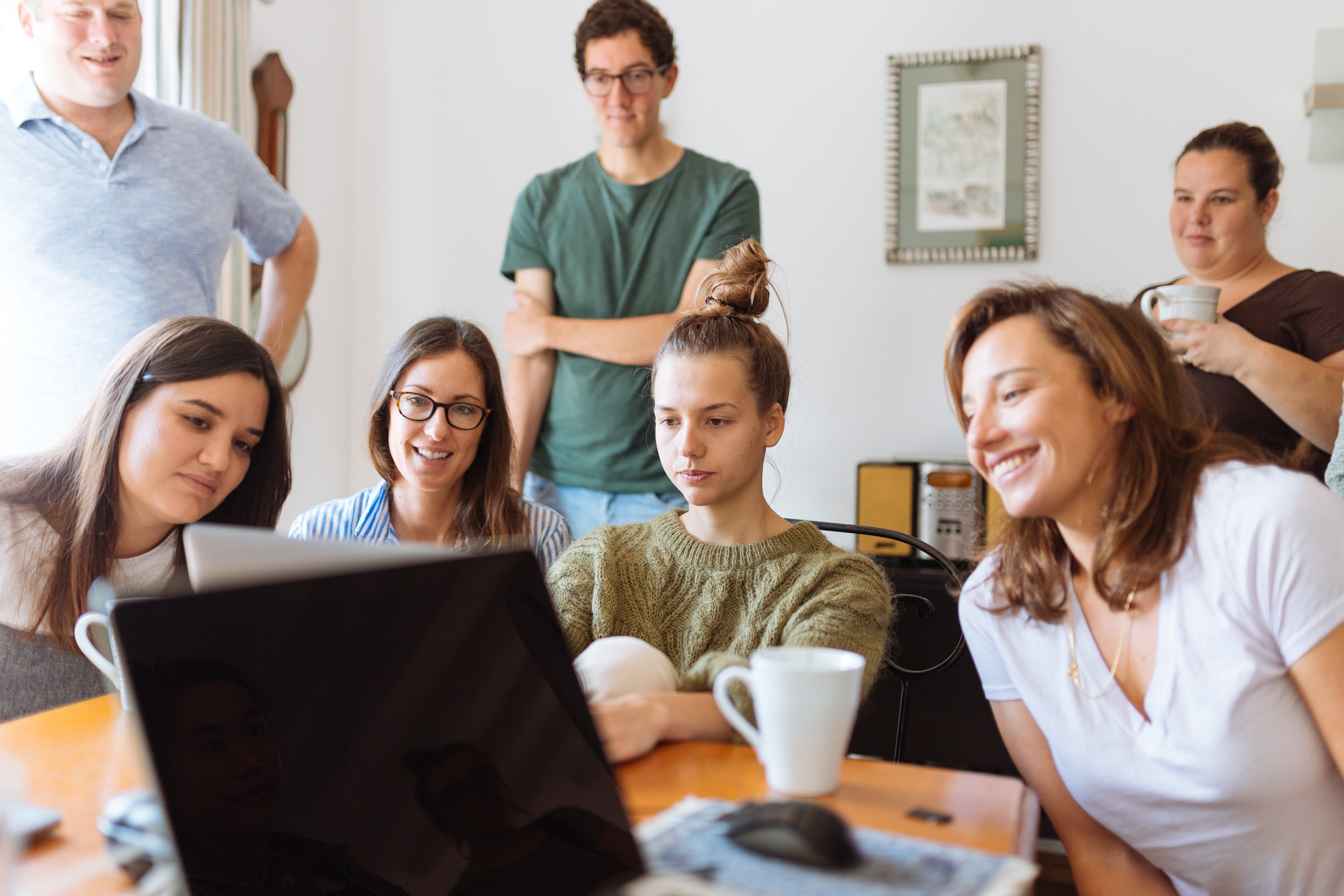 people-looking-at-laptop-computer-1595391.jpg